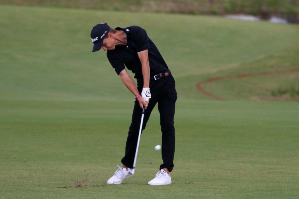 An Edge student golfer taking a shot. Tróia peninsula, Portugal